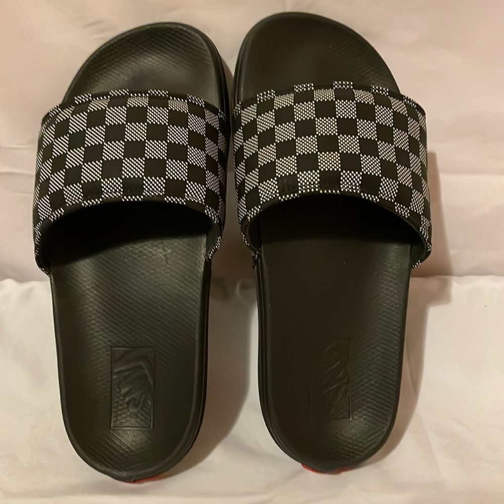 Vans checker board slides.
